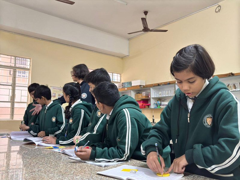 Middle school students in Class 6 engaging in STEM projects at Ashoka Academy Lakhisarai